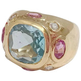 Elegant Three-Stone Ring with Gold Rope Twist Border with Blue Topaz and Pink Topaz