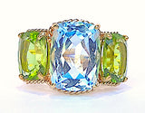 Elegant Three-Stone Ring with Gold Rope Twist Border with Blue Topaz and Pink Topaz