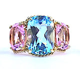 Elegant Three-Stone Ring with Gold Rope Twist Border with Blue Topaz and Pink Topaz