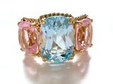 Elegant Three-Stone Ring with Gold Rope Twist Border with Blue Topaz and Pink Topaz