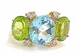 Amethyst and Peridot Yellow Gold Three-Stone Cushion Ring